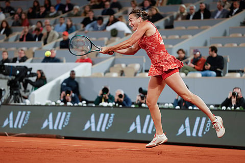 Aryna Sabalenka plays a shot against Erika Andreeva